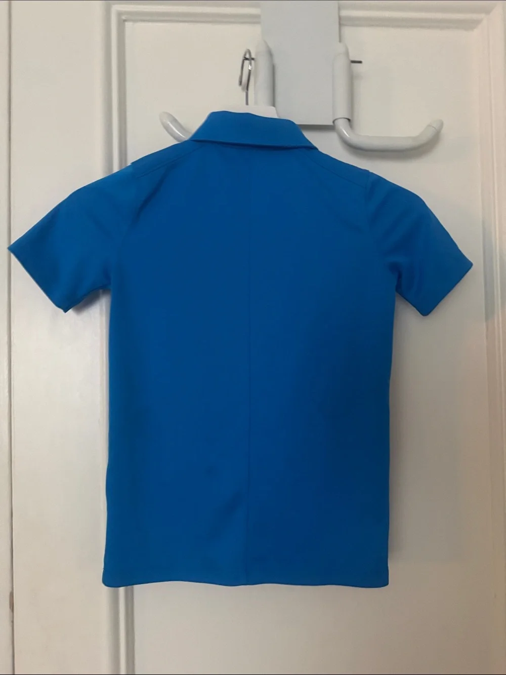 Nike Kids Bright Blue Polo Shirt with Black Swoosh